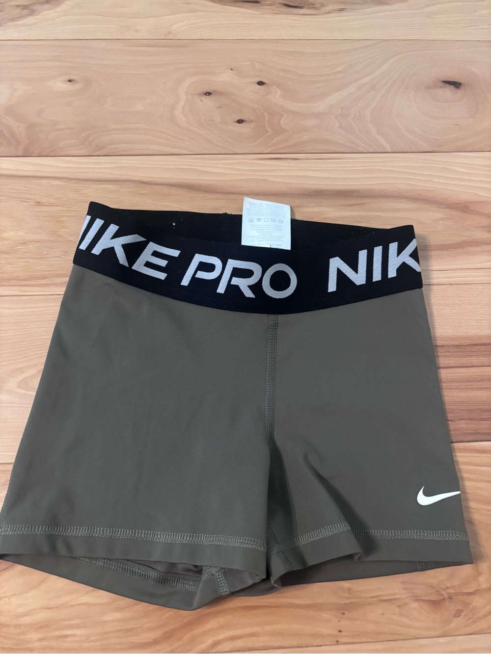 Nike Pro Olive Green Athletic Shorts with Black Elastic Waistband